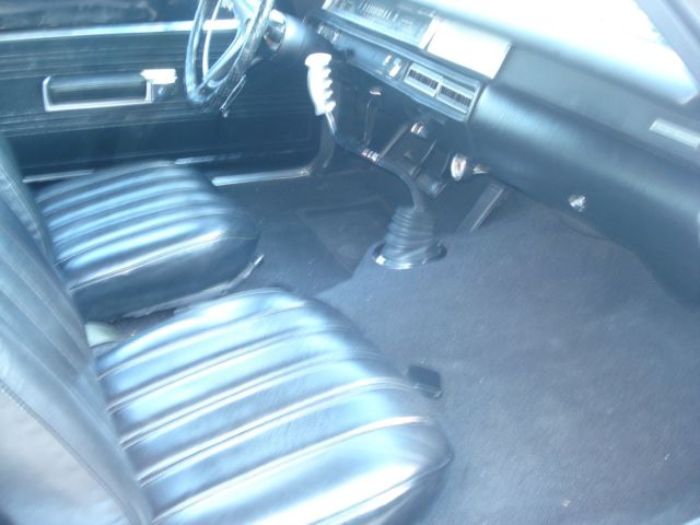 1969 plum Plymouth Road Runner Coupe