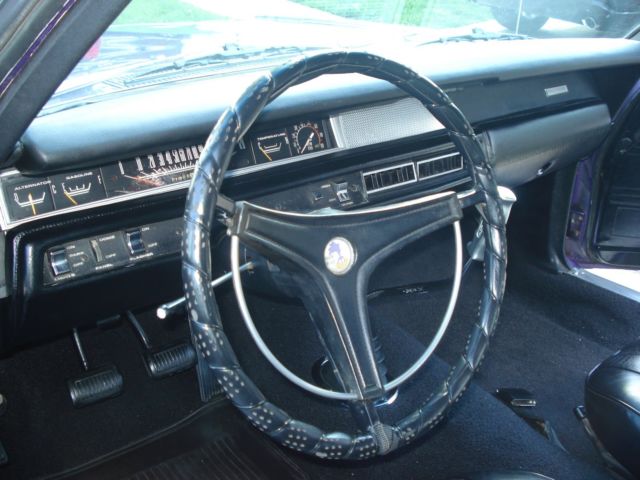 1969 plum Plymouth Road Runner Coupe