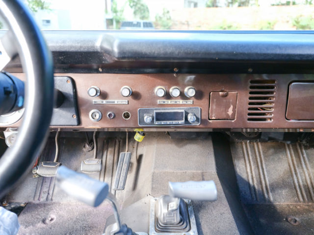 1969 brown and white Ford Bronco SUV