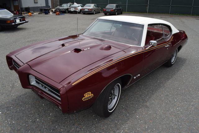 1969 Burgundy Pontiac GTO Coupe