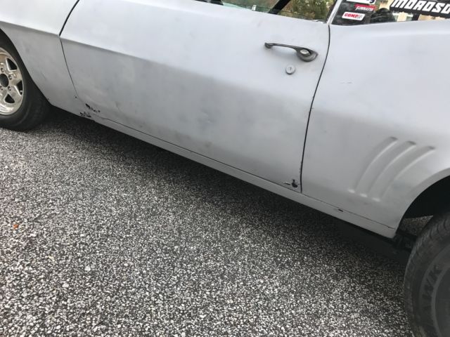 1969 primer Chevrolet Camaro Coupe