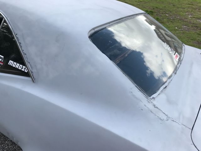 1969 primer Chevrolet Camaro Coupe