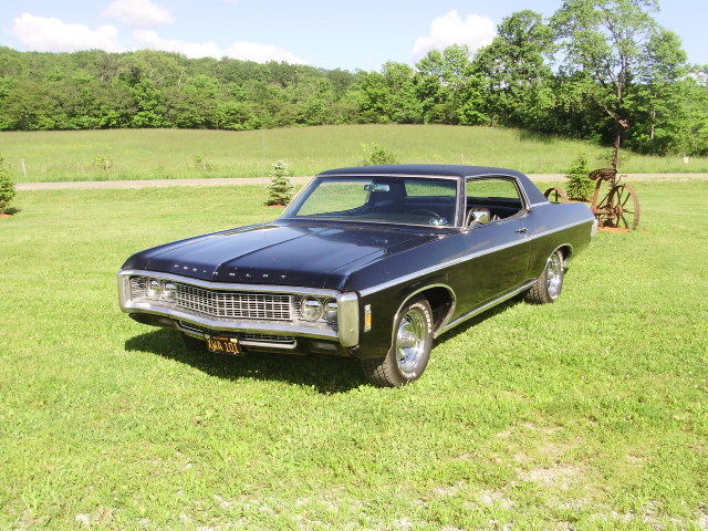 1969 black Chevrolet Impala Coupe