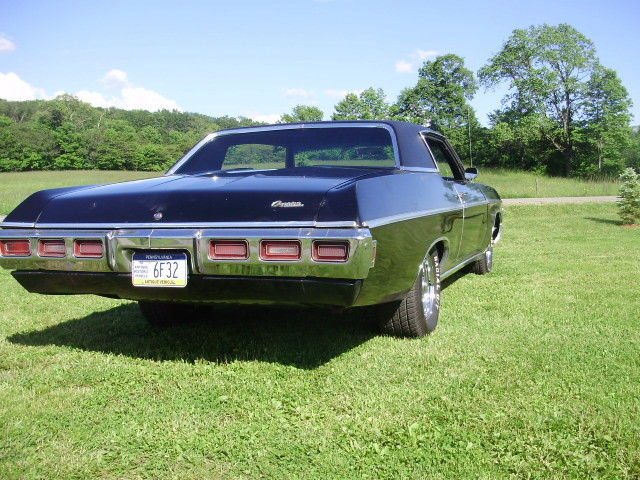 1969 black Chevrolet Impala Coupe