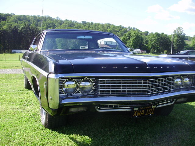 1969 black Chevrolet Impala Coupe
