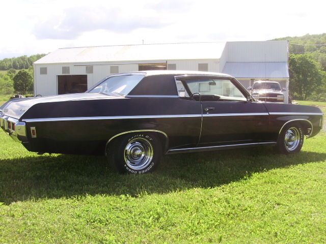 1969 black Chevrolet Impala Coupe