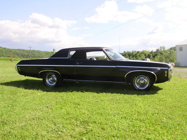 1969 black Chevrolet Impala Coupe