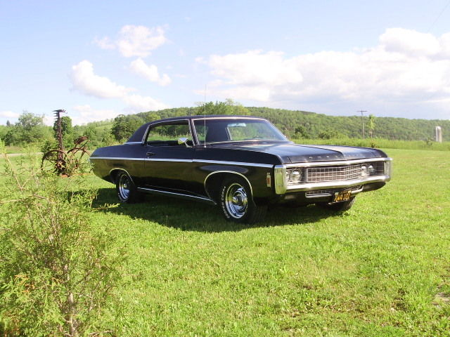 1969 black Chevrolet Impala Coupe