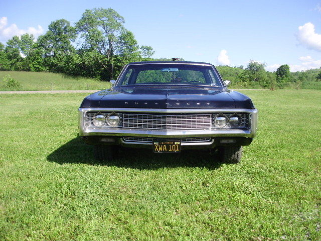 1969 black Chevrolet Impala Coupe