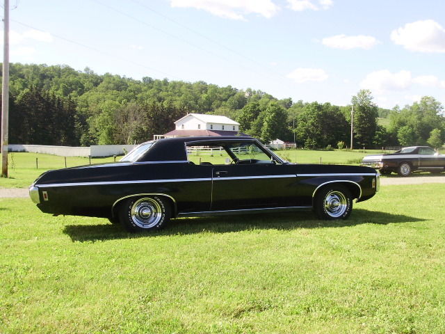 1969 black Chevrolet Impala Coupe