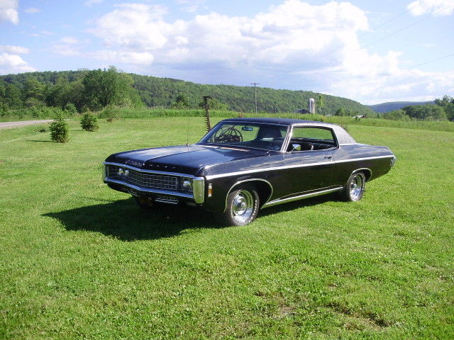 1969 black Chevrolet Impala Coupe