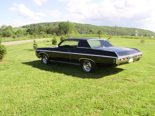 1969 black Chevrolet Impala Coupe
