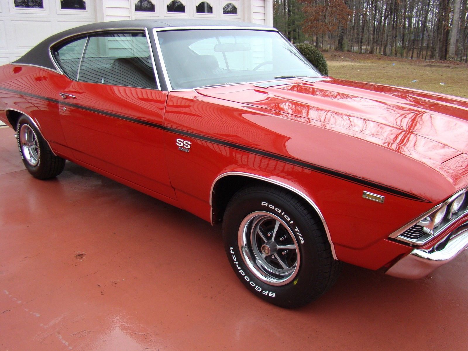 1969 red Chevrolet Chevelle 2 door coupe