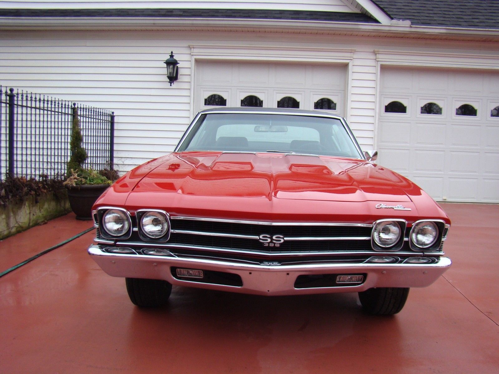 1969 red Chevrolet Chevelle 2 door coupe