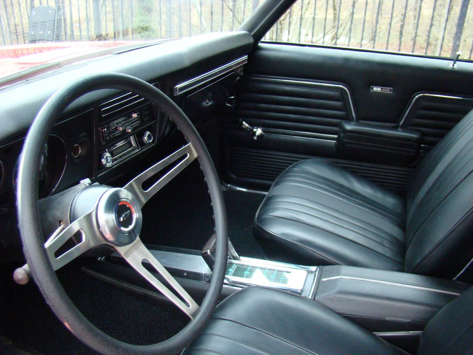 1969 red Chevrolet Chevelle 2 door coupe