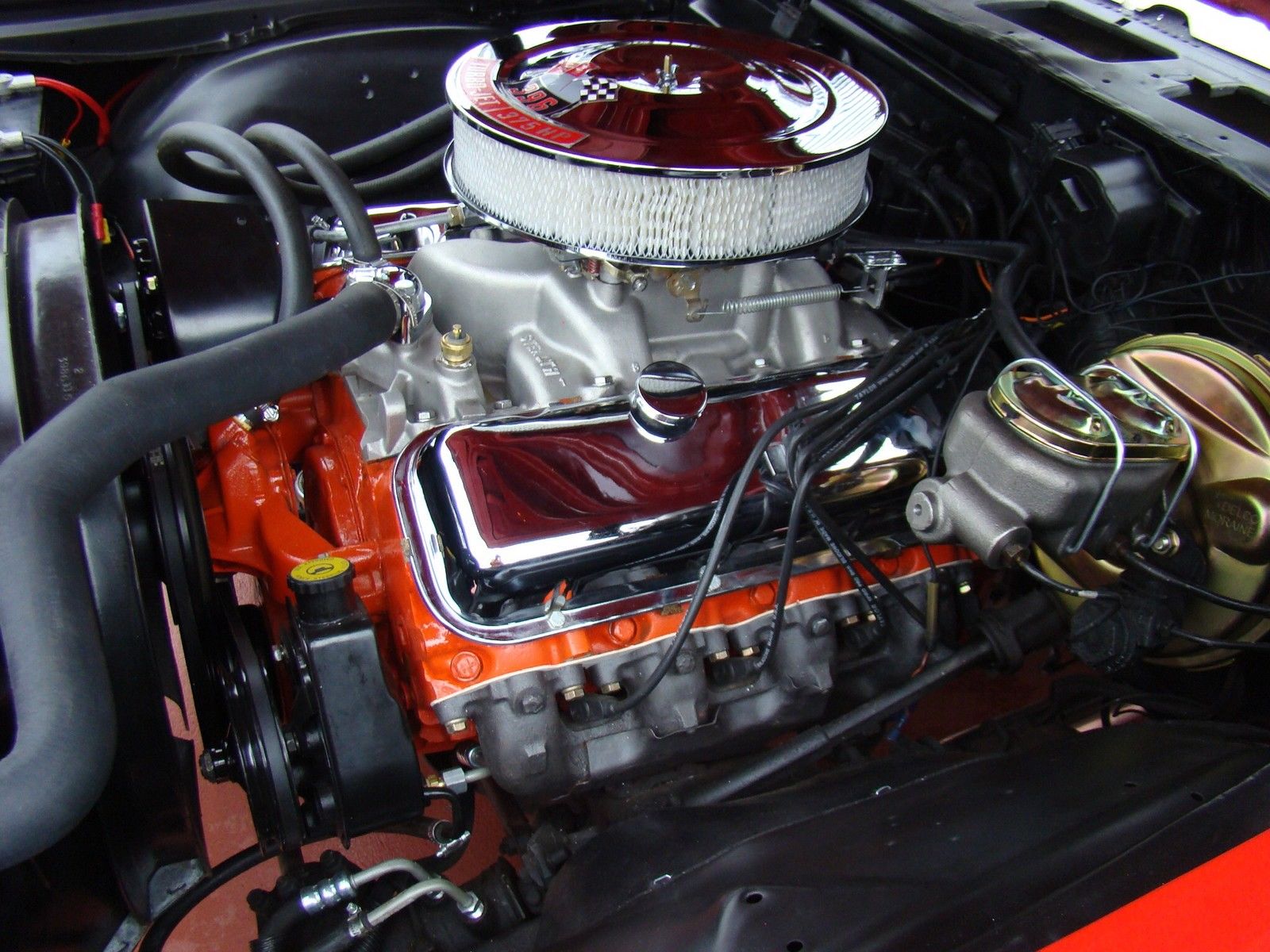 1969 red Chevrolet Chevelle 2 door coupe