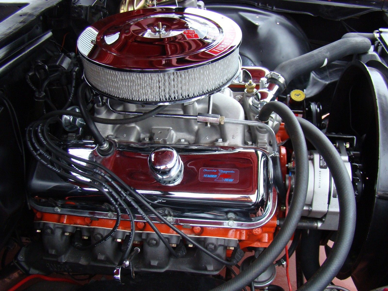 1969 red Chevrolet Chevelle 2 door coupe