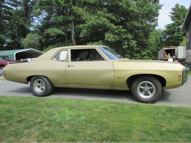 1969 Gold Chevrolet Biscayne Sedan