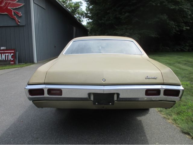 1969 Gold Chevrolet Biscayne Sedan