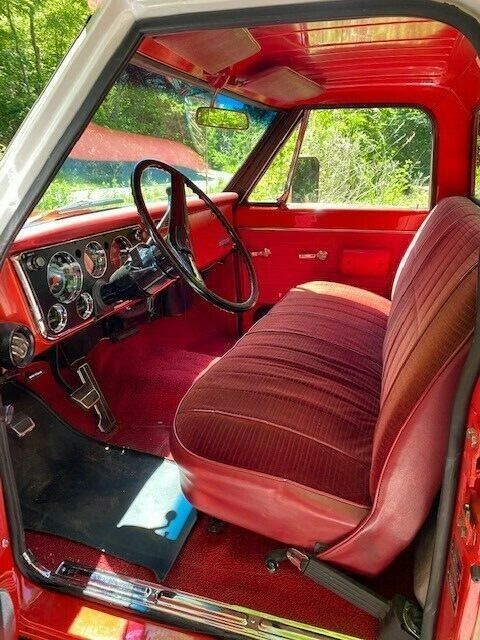 1969 orange and white Chevrolet C20 Standard cab long bed pickup
