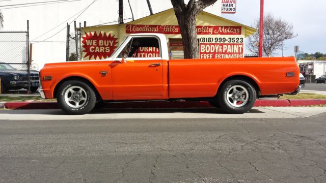 1969 Orange/white Chevrolet C-10