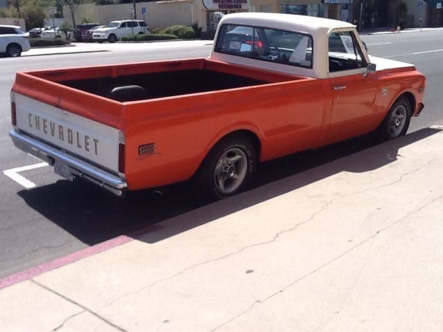 1969 Orange/white Chevrolet C-10