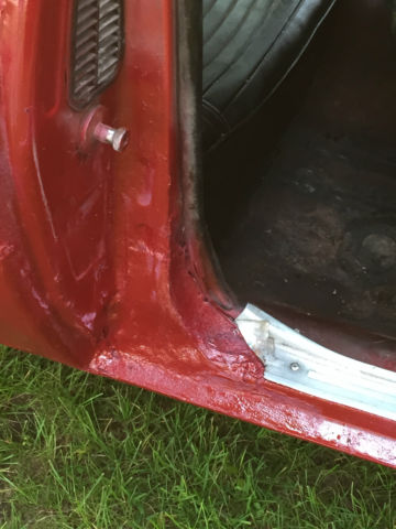 1969 red/ hugger orange Chevrolet Camaro Coupe