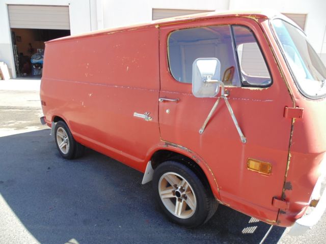 1969 red Chevrolet Other van