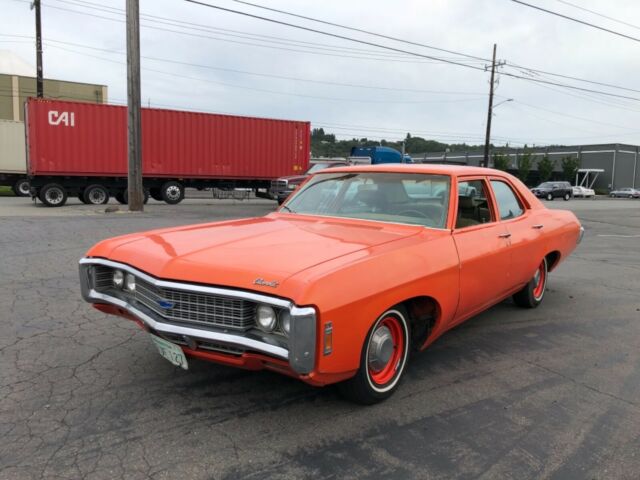 1969 Orange Chevrolet Impala Sedan