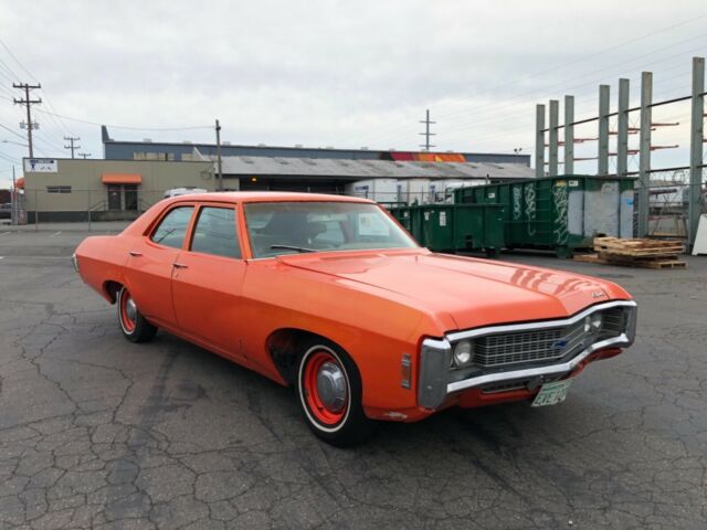 1969 Orange Chevrolet Impala Sedan
