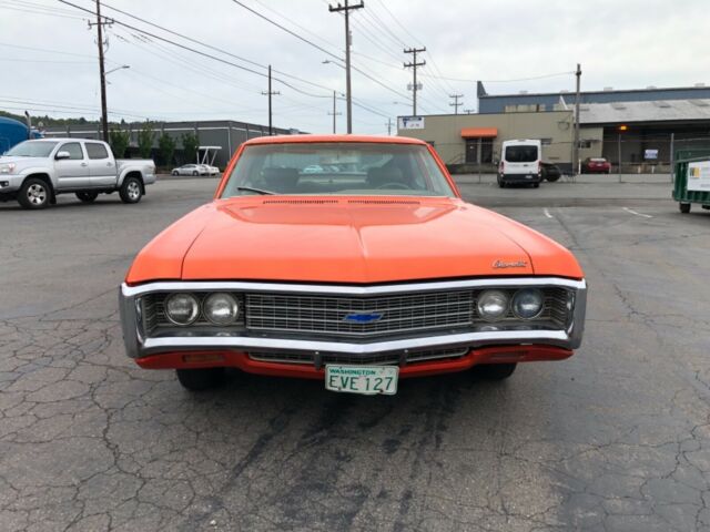 1969 Orange Chevrolet Impala Sedan