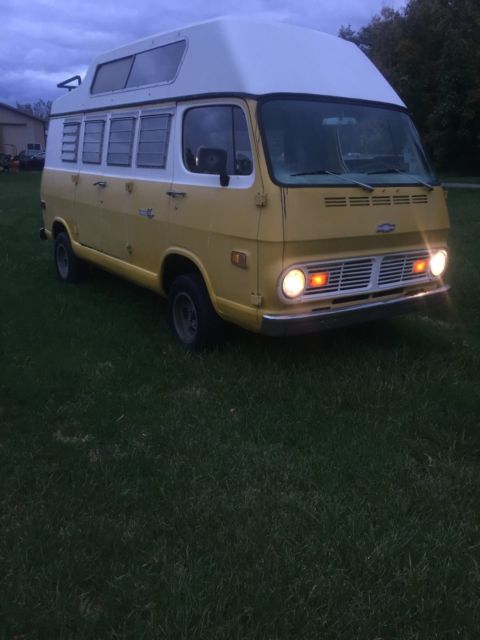 1969 yellow Chevrolet C-10 Van Camper