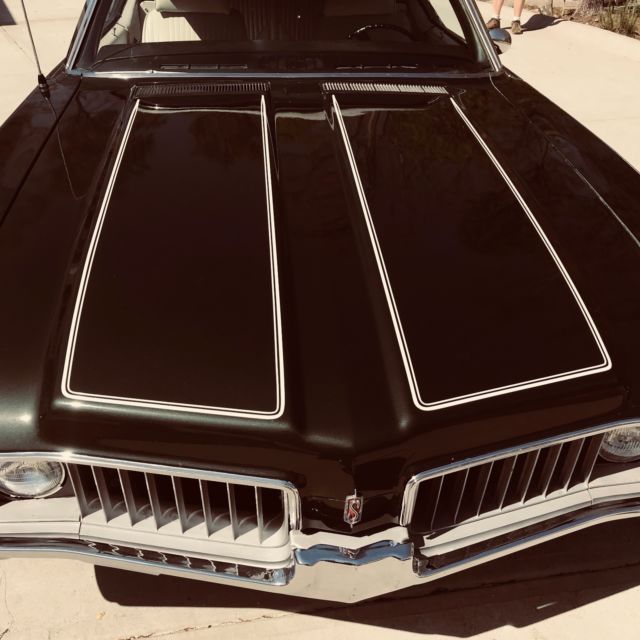 1969 Green Oldsmobile Cutlass Convertible