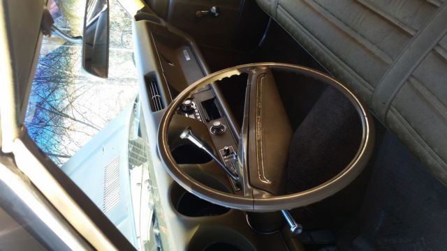 1969 Gold Oldsmobile Cutlass Coupe