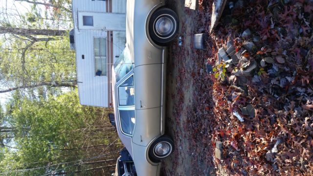 1969 Gold Oldsmobile Cutlass Coupe