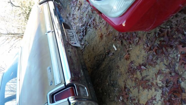 1969 Gold Oldsmobile Cutlass Coupe