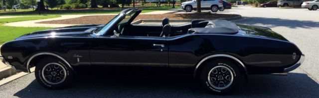 1969 Red Oldsmobile Cutlass Convertible
