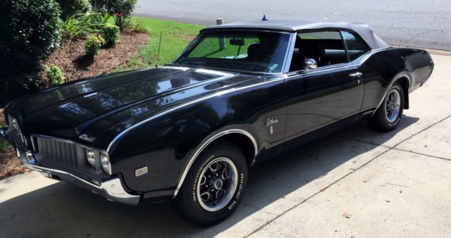 1969 Red Oldsmobile Cutlass Convertible