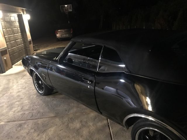 1969 Black Oldsmobile Cutlass Convertible