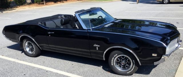 1969 Red Oldsmobile Cutlass Convertible