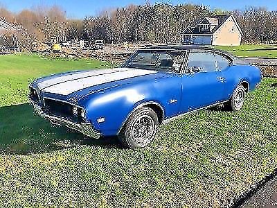 1969 Blue Oldsmobile Cutlass Coupe