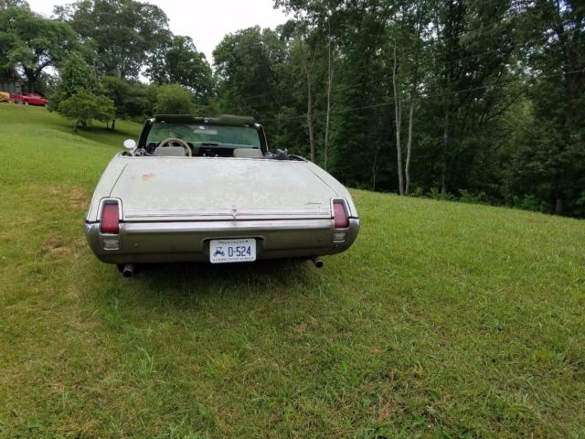 1969 Green Oldsmobile Cutlass Convertible