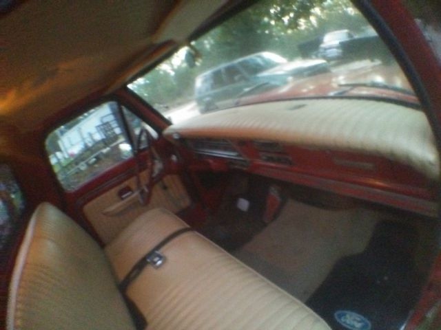 1969 Red and White Ford F-100 Pick up