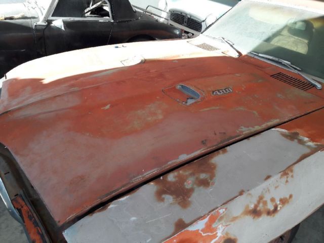 1969 Burgundy Pontiac Firebird Coupe