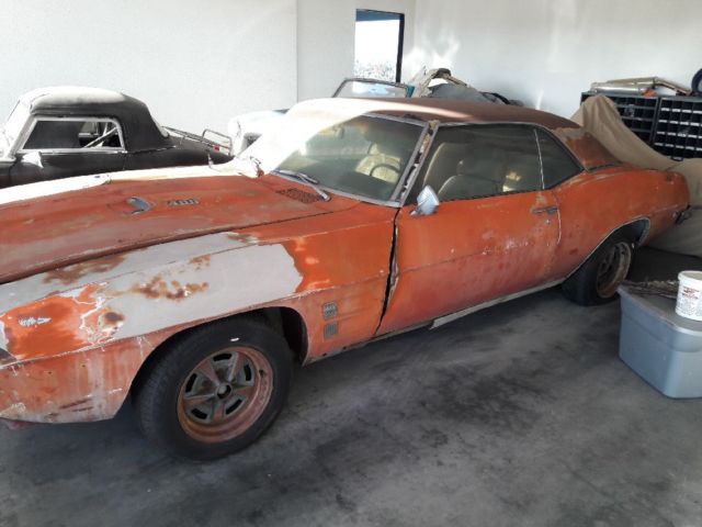 1969 Burgundy Pontiac Firebird Coupe