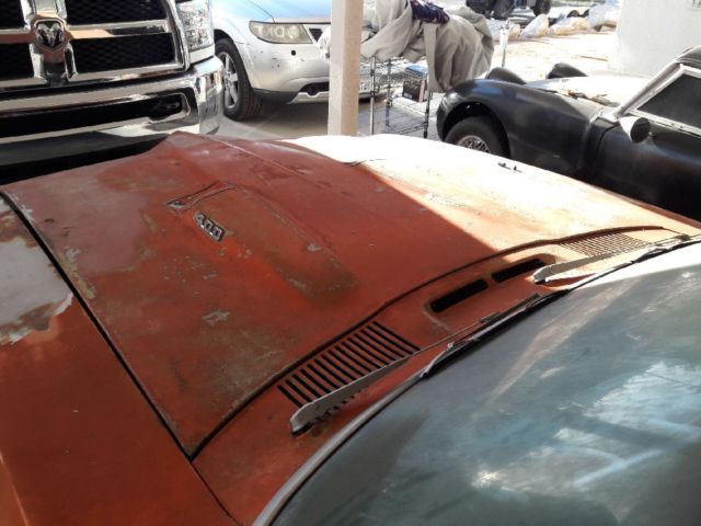 1969 Burgundy Pontiac Firebird Coupe