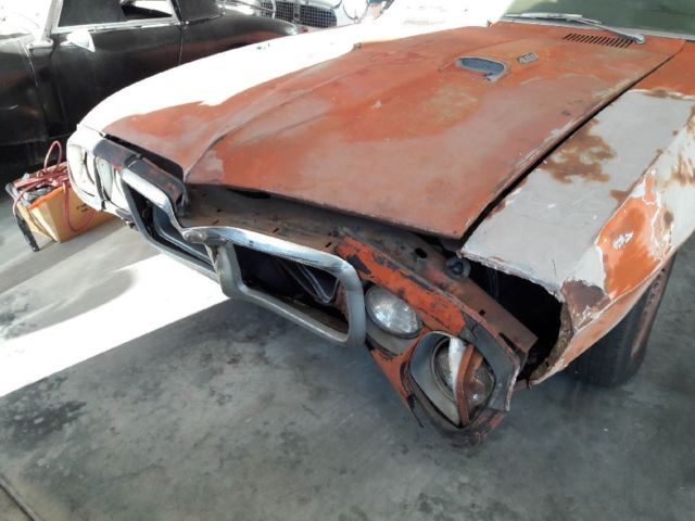 1969 Burgundy Pontiac Firebird Coupe
