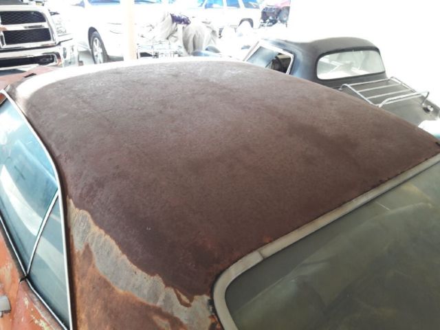 1969 Burgundy Pontiac Firebird Coupe