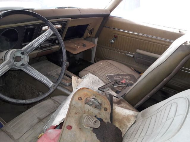 1969 Burgundy Pontiac Firebird Coupe