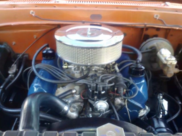 1969 Orange Ford F-100 Standard Cab Pickup